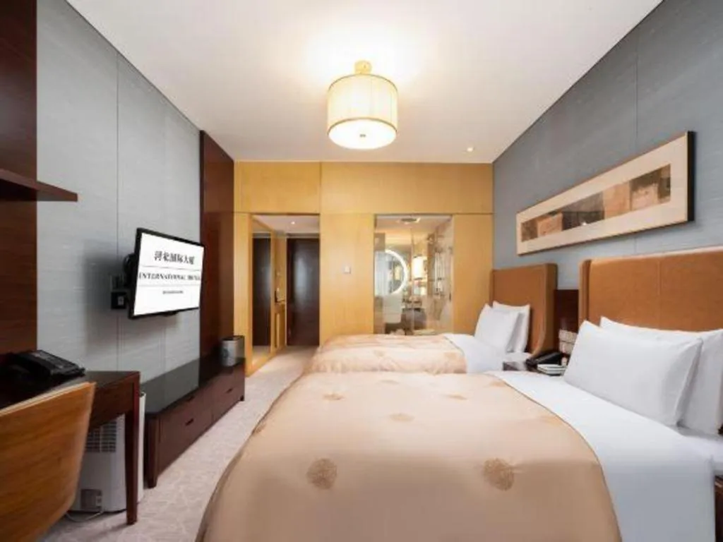 Bed in Shijiazhuang International Building Hotel