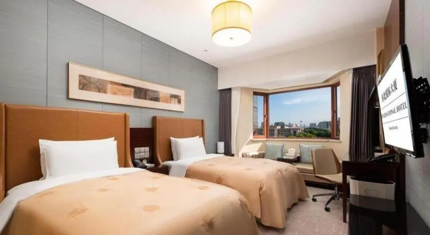 Bed in Shijiazhuang International Building Hotel