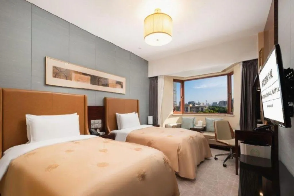 Bed in Shijiazhuang International Building Hotel