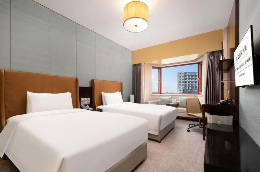 Bed in Shijiazhuang International Building Hotel