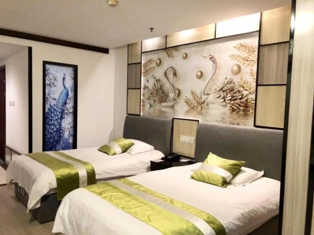 Bed in GreenTree Inn Taicang Baolong Square Hotel