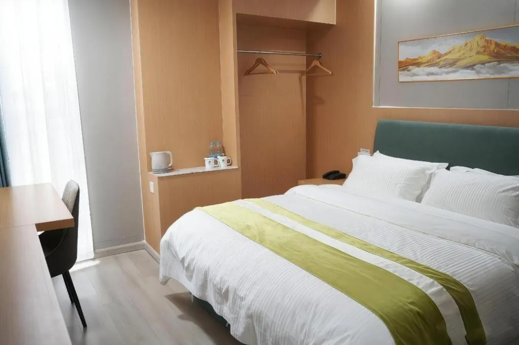 Bed in GreenTree Inn Taicang Baolong Square Hotel