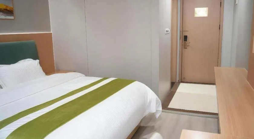 Bed in GreenTree Inn Taicang Baolong Square Hotel