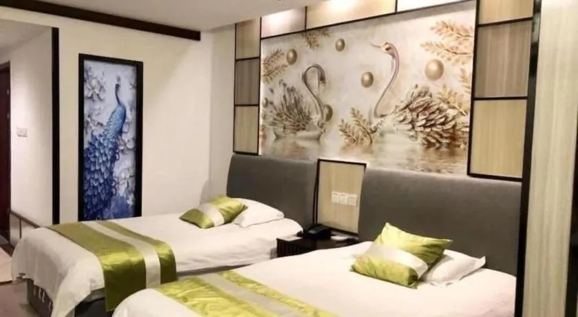 Bed in GreenTree Inn Taicang Baolong Square Hotel