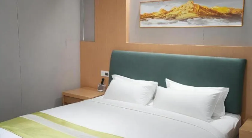 Bed in GreenTree Inn Taicang Baolong Square Hotel