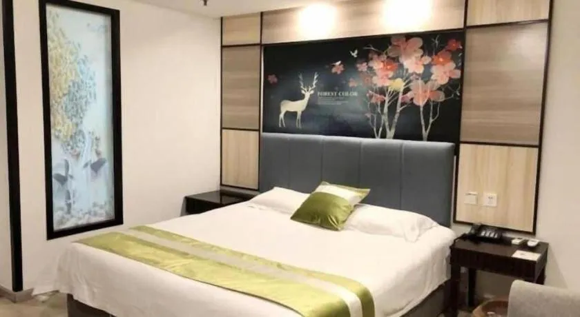 Bed in GreenTree Inn Taicang Baolong Square Hotel