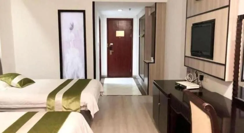 Bed in GreenTree Inn Taicang Baolong Square Hotel