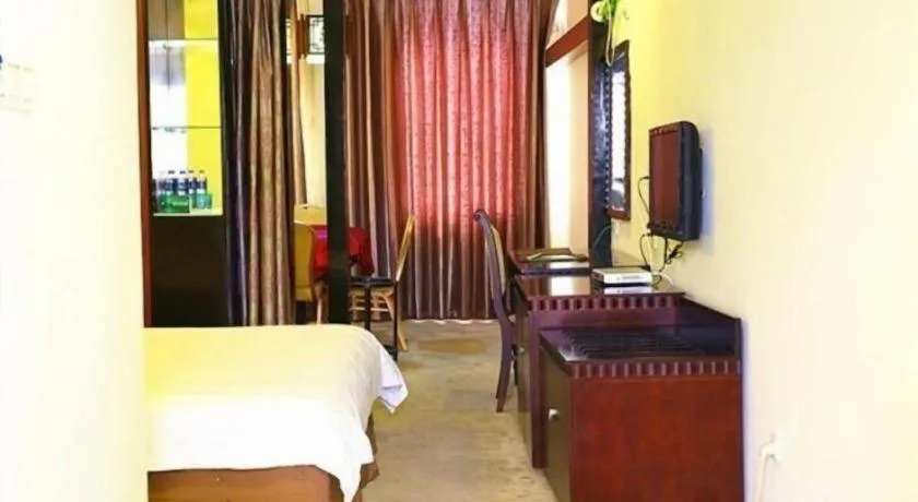 Bed in GreenTree Inn Taicang Baolong Square Hotel