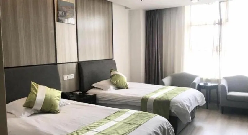 Bed in GreenTree Inn Taicang Baolong Square Hotel