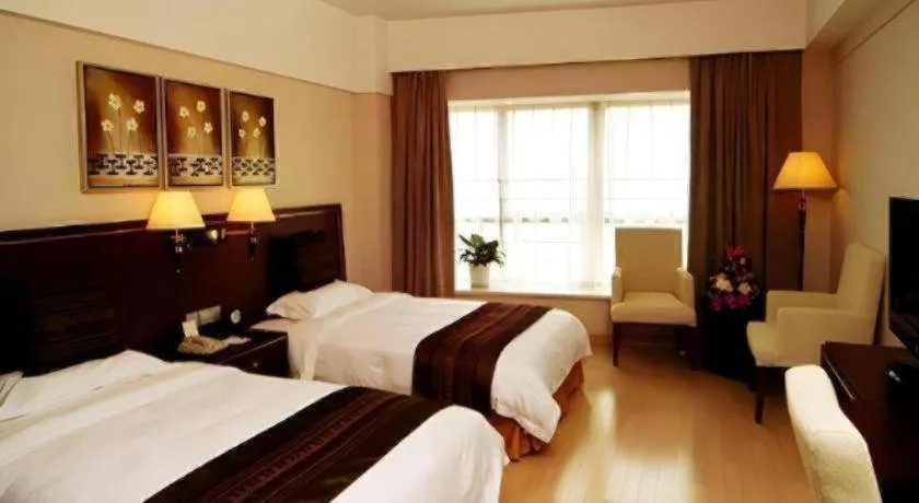 Bed in GreenTree Inn Rizhao Haiqu East Road Hotel