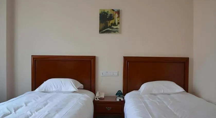 Bed in GreenTree Inn Rizhao Haiqu East Road Hotel