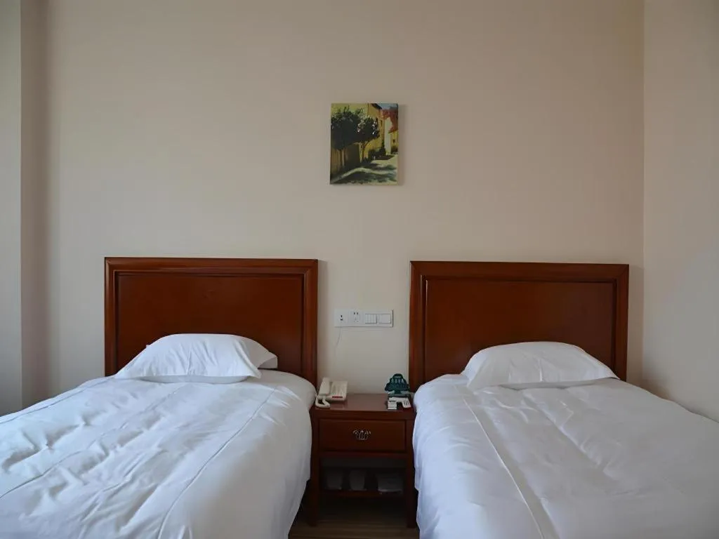 Bed in GreenTree Inn Rizhao Haiqu East Road Hotel