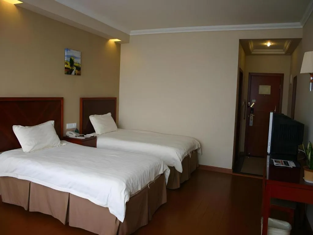 Bed in GreenTree Inn Rizhao Haiqu East Road Hotel