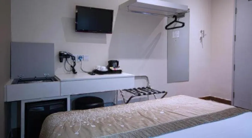 Bed in The Keong Saik Hotel