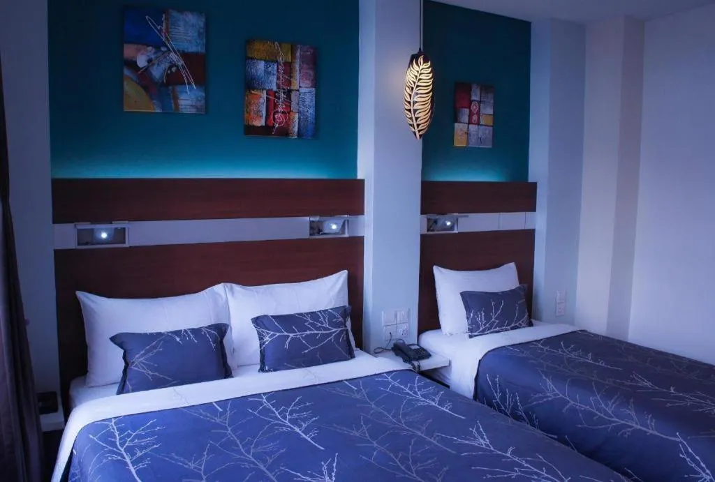 Bed in The Keong Saik Hotel