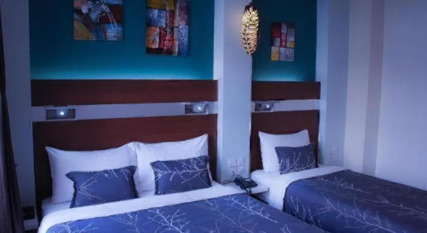 Bed in The Keong Saik Hotel