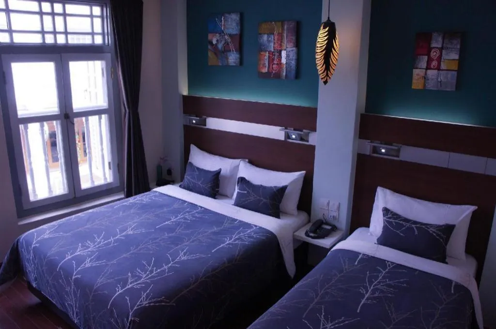 Bed in The Keong Saik Hotel