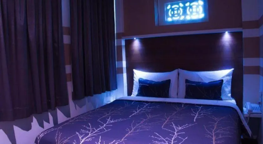 Bed in The Keong Saik Hotel