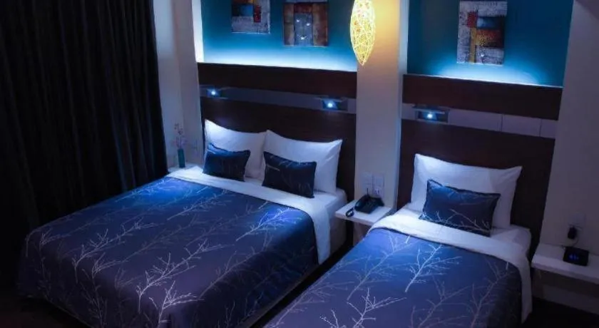 Bed in The Keong Saik Hotel