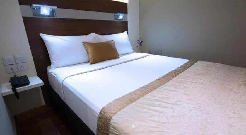 Bed in The Keong Saik Hotel