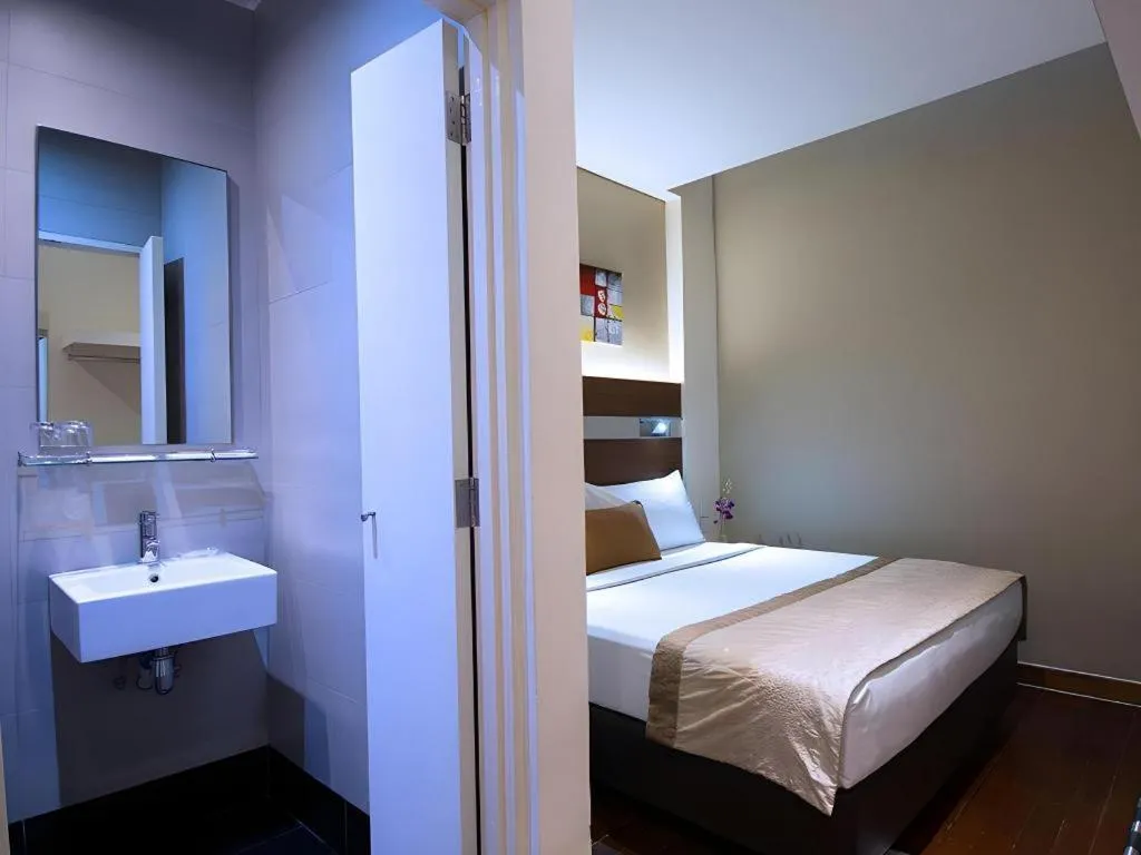 Bed in The Keong Saik Hotel