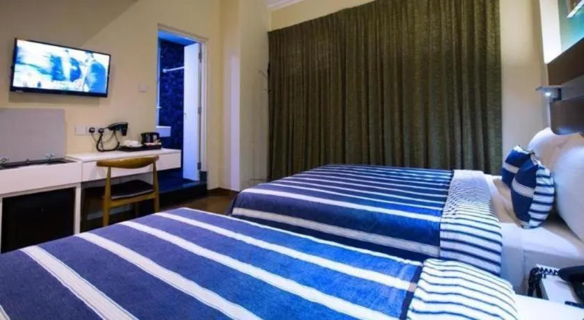 Bed in The Keong Saik Hotel