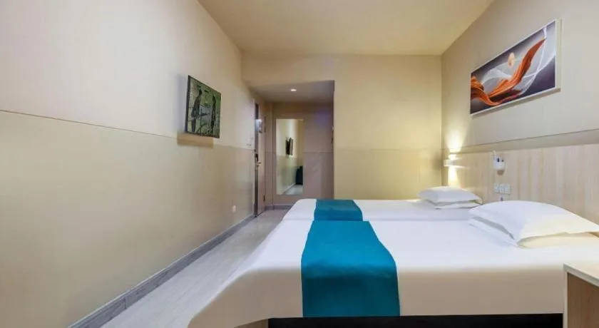 Bed in Jinjiang Inn Taiyuan Longtan Park