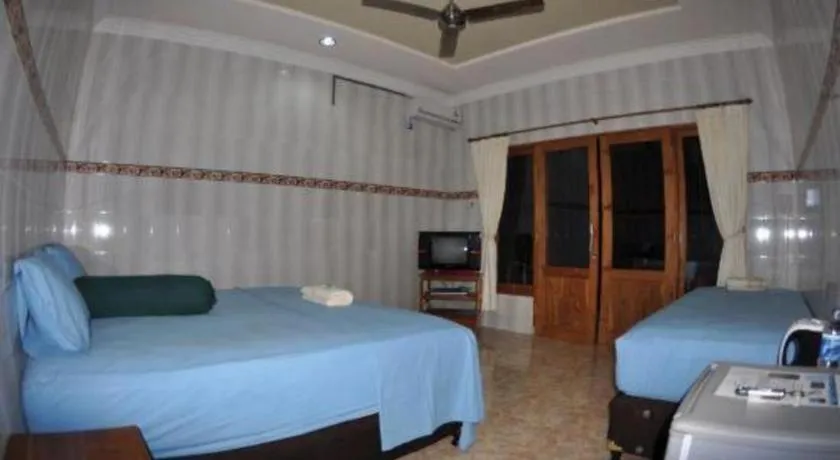 Bed in Tulamben Wreck Divers Resort & Restaurant