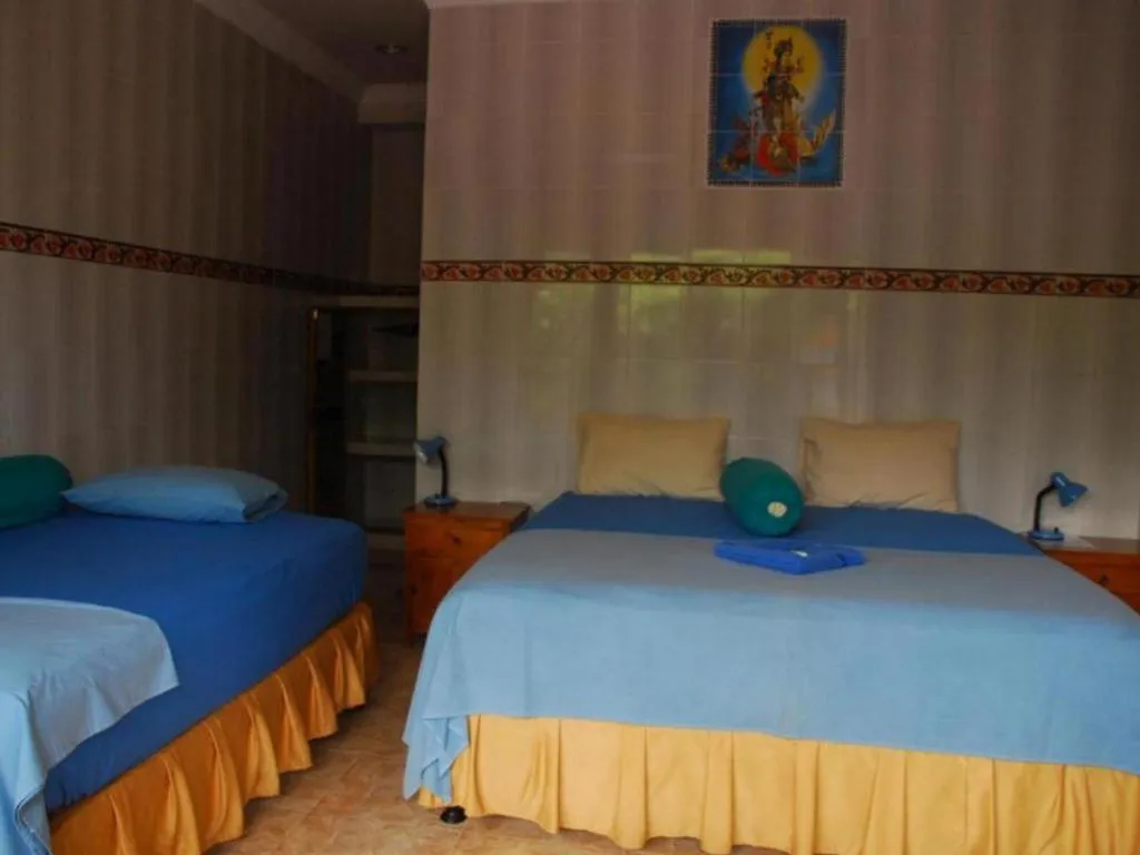 Bed in Tulamben Wreck Divers Resort & Restaurant