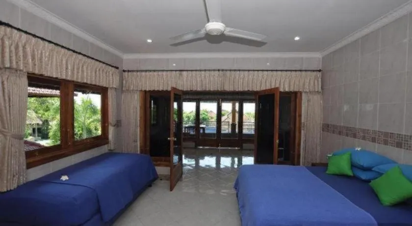 Bed in Tulamben Wreck Divers Resort & Restaurant