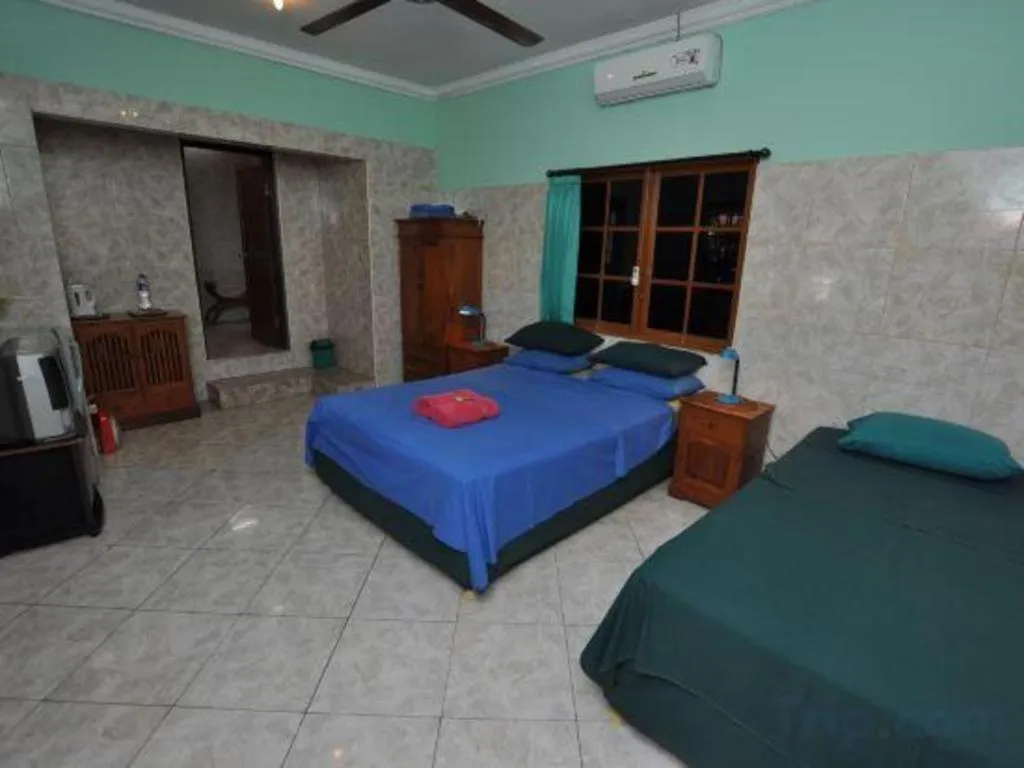 Bed in Tulamben Wreck Divers Resort & Restaurant