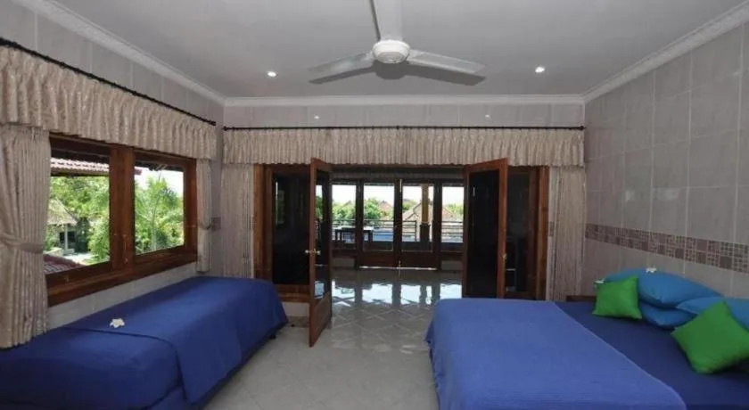 Bed in Tulamben Wreck Divers Resort & Restaurant