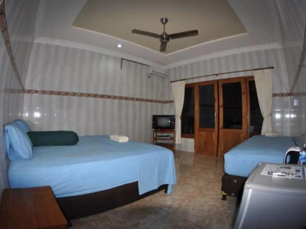 Bed in Tulamben Wreck Divers Resort & Restaurant