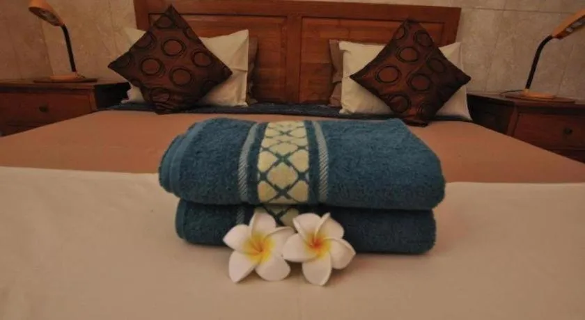 Bed in Tulamben Wreck Divers Resort & Restaurant