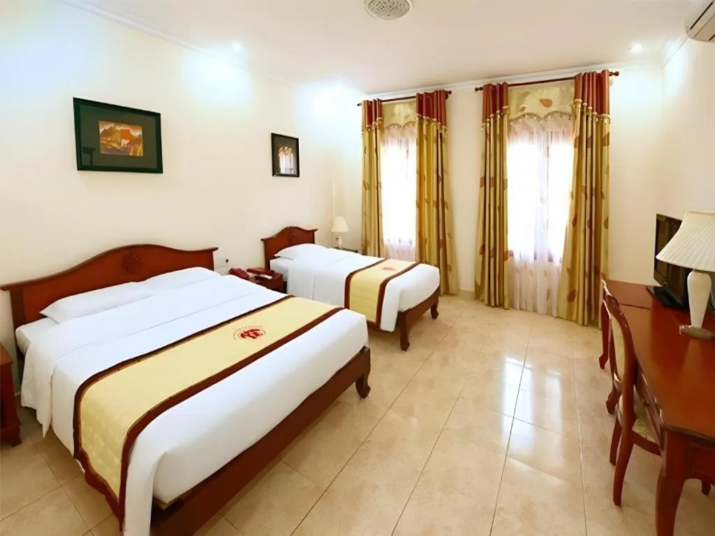 Bed in Tan Son Nhat Hotel