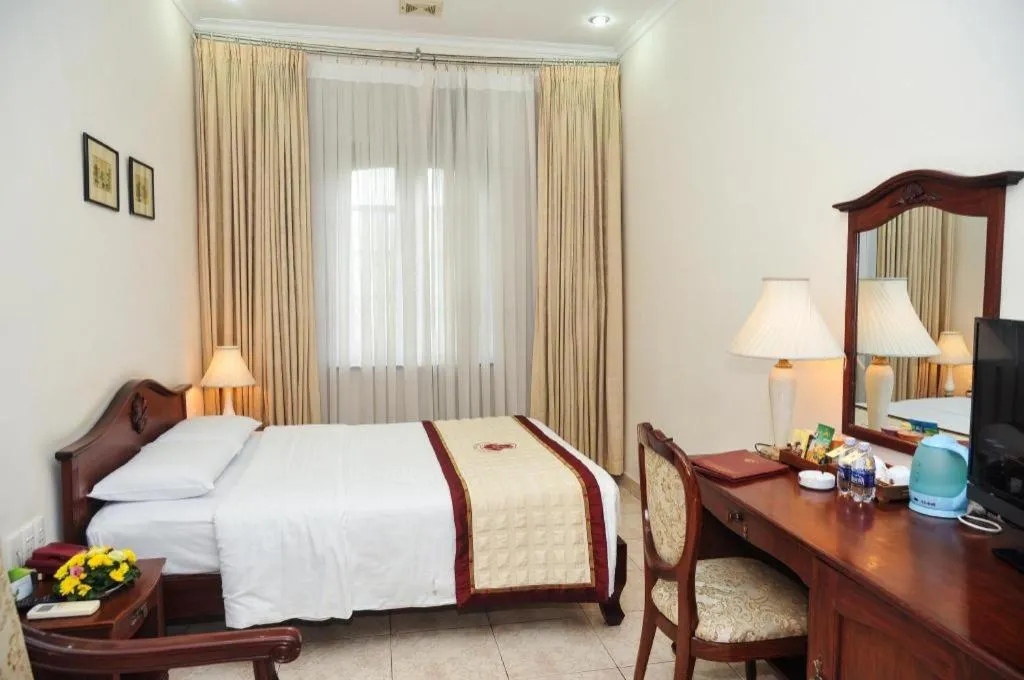 Bed in Tan Son Nhat Hotel