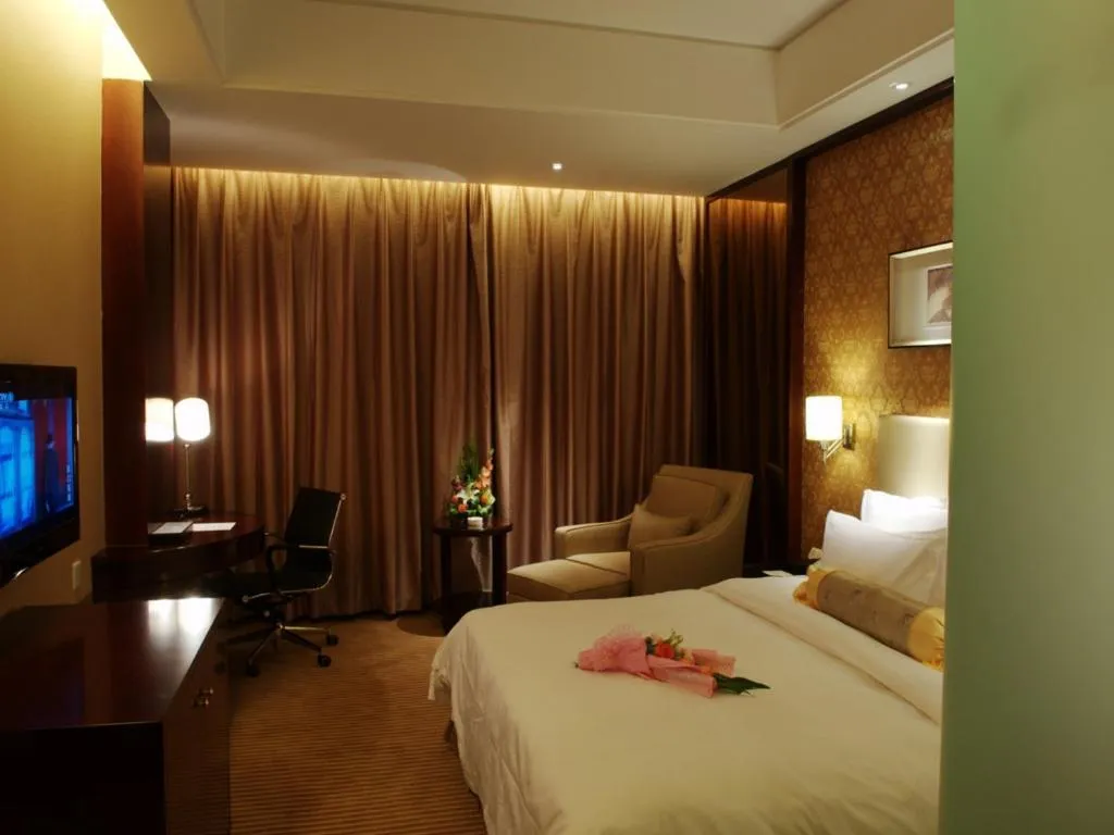 Bed in Yiwu Shinsun International Hotel