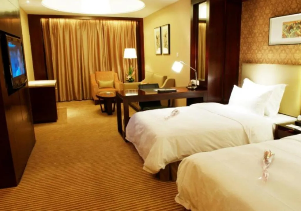 Bed in Yiwu Shinsun International Hotel