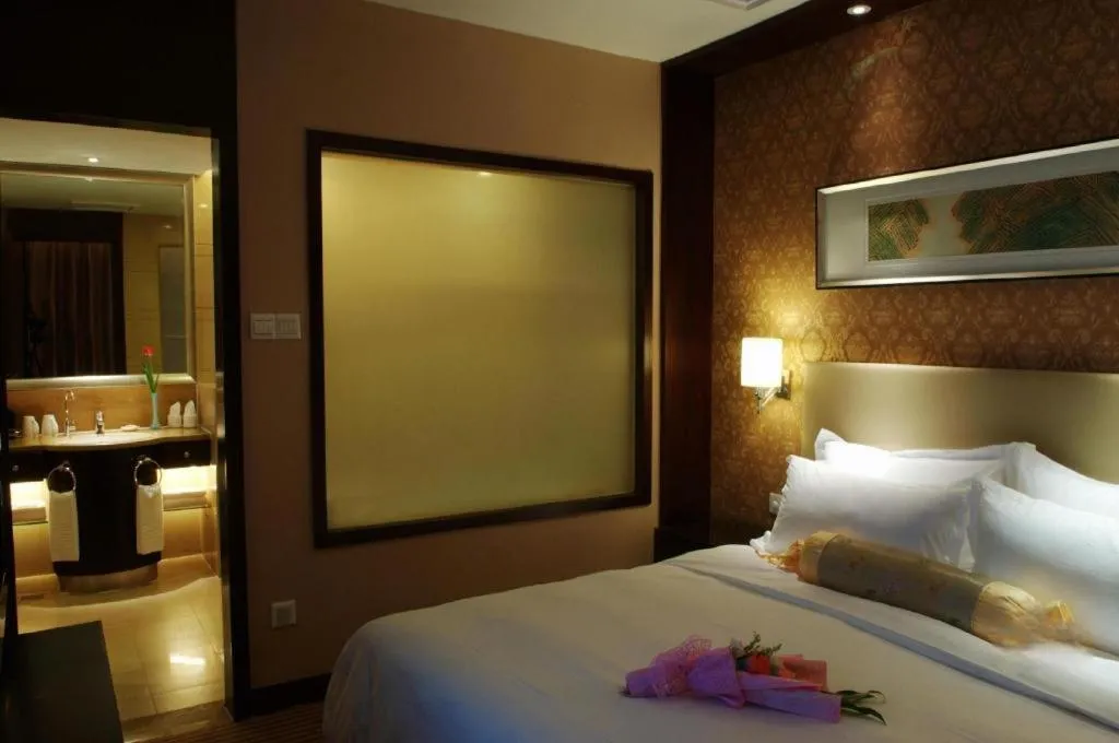 Bed in Yiwu Shinsun International Hotel