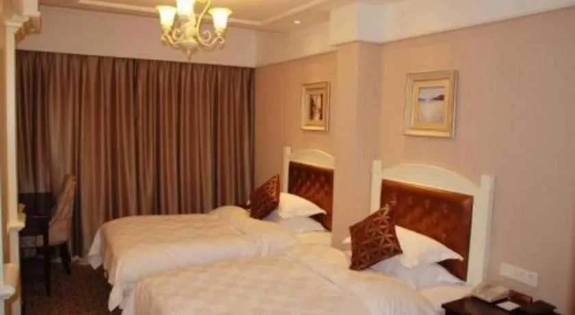 Bed in Hangzhou Silver Star Hotel