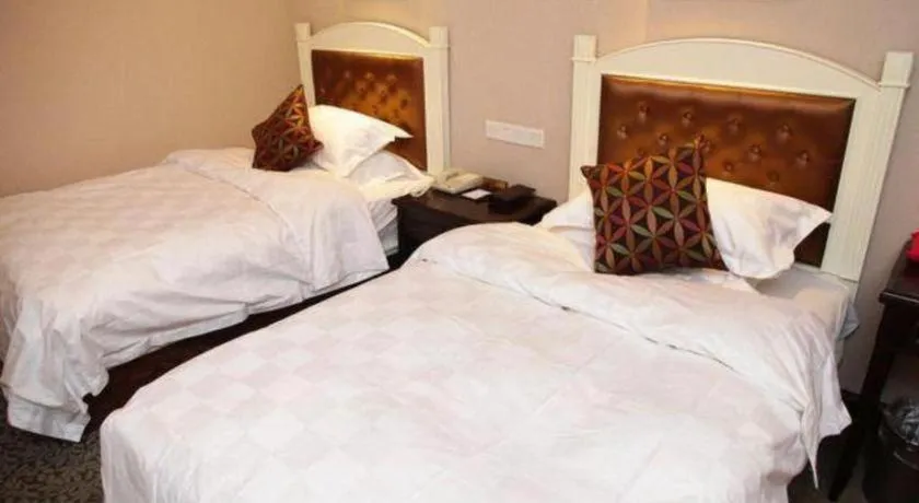 Bed in Hangzhou Silver Star Hotel