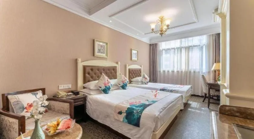 Bed in Hangzhou Silver Star Hotel