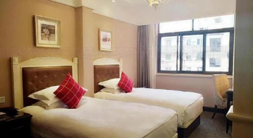 Bed in Hangzhou Silver Star Hotel