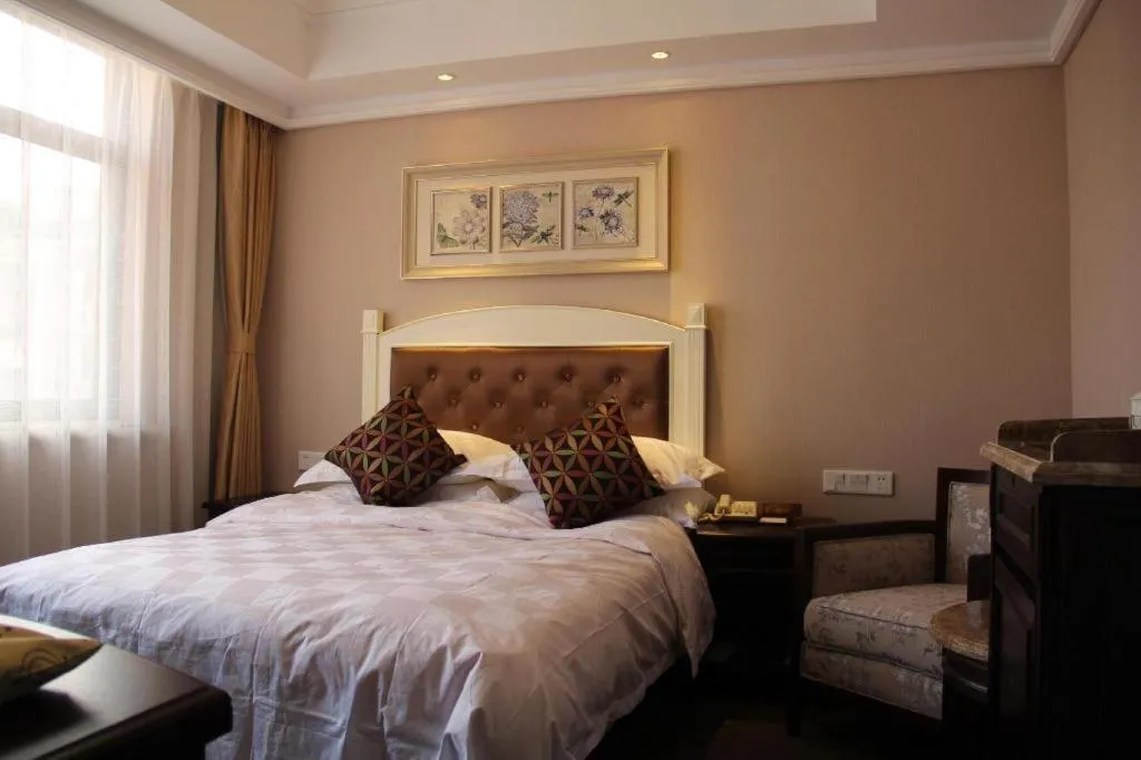 Bed in Hangzhou Silver Star Hotel