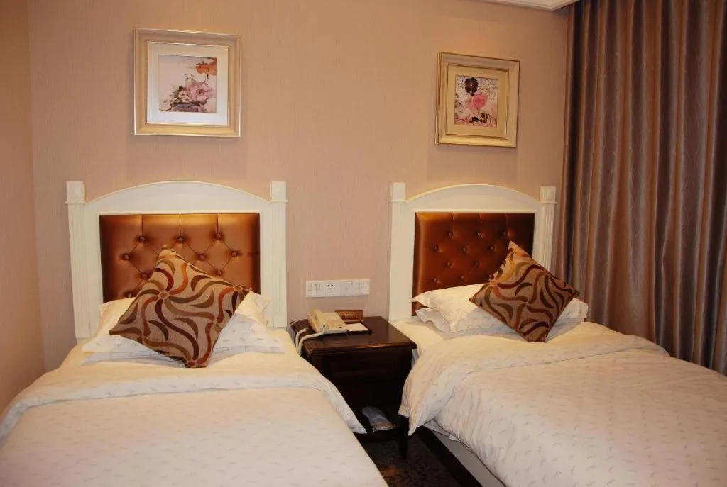 Bed in Hangzhou Silver Star Hotel