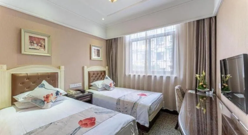 Bed in Hangzhou Silver Star Hotel