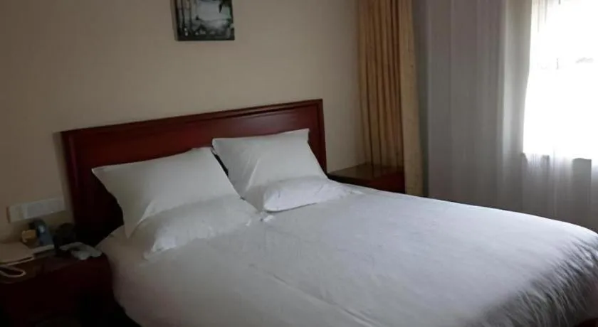 Bed in GreenTree Alliance Changzhou University City Hotel