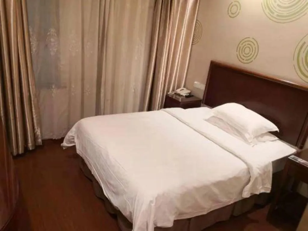 Bed in GreenTree Alliance Changzhou University City Hotel