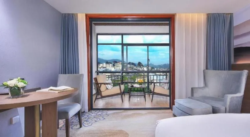 Bed in Vienna Hotel Guangxi Guilin 7-Star Wanda Plaza