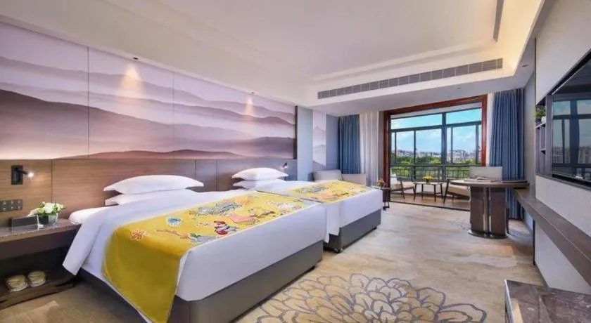 Bed in Vienna Hotel Guangxi Guilin 7-Star Wanda Plaza